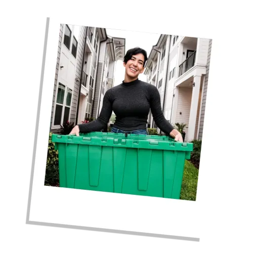 Stack Moves customer unpacking from reusable moving bins after a move